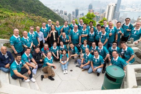 cathay cargo team taking a group picture at the peak