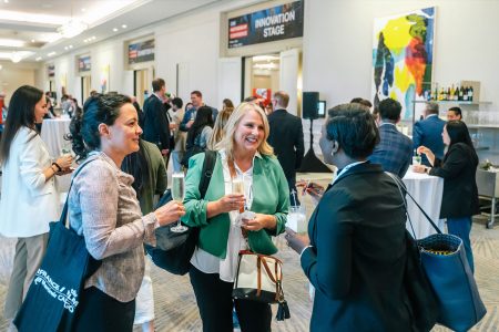 Delegates in conversation at the CNS Partnership Conference in Miami