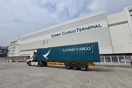 A Cathay Cargo-branded semi-truck outside the Cathay Cargo Terminal in Hong Kong