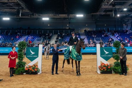 Director Cargo Dominic Perret hands out a prize at the Hong Kong International Horse Show