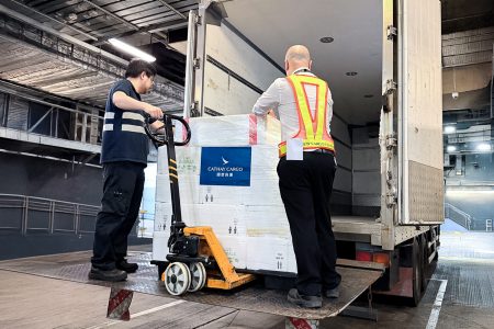 The lobsters are loaded on to a truck at the Cathay Cargo Terminal